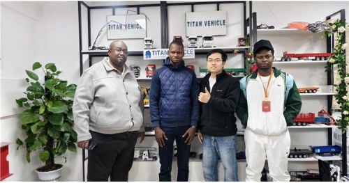 Tanzania Customer Visited TITAN and Purchased 2 Axle Flatbed Trailer