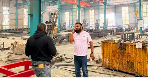Tanzanian Customer Visited Titan and Purchased a 4 Axle Semi Flatbed Trailer