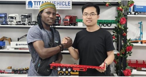 Tanzanian Customer Visited TITAN Guangzhou Office to Purchase Flatbed Trailer