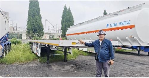 Peruvian Customer Visits TITAN to Purchase Tri Axle Flatbed Trailer
