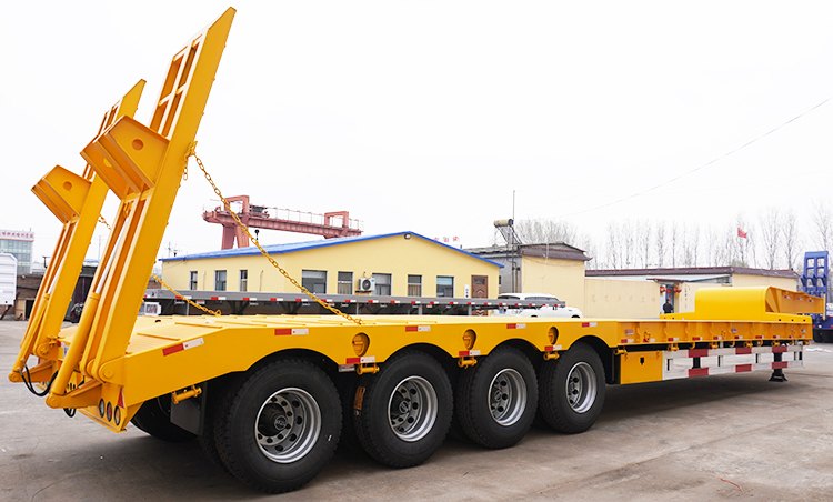 100 Ton 4 Axle Semi Low Bed Trailer for Sale with Hydraulic Ramp